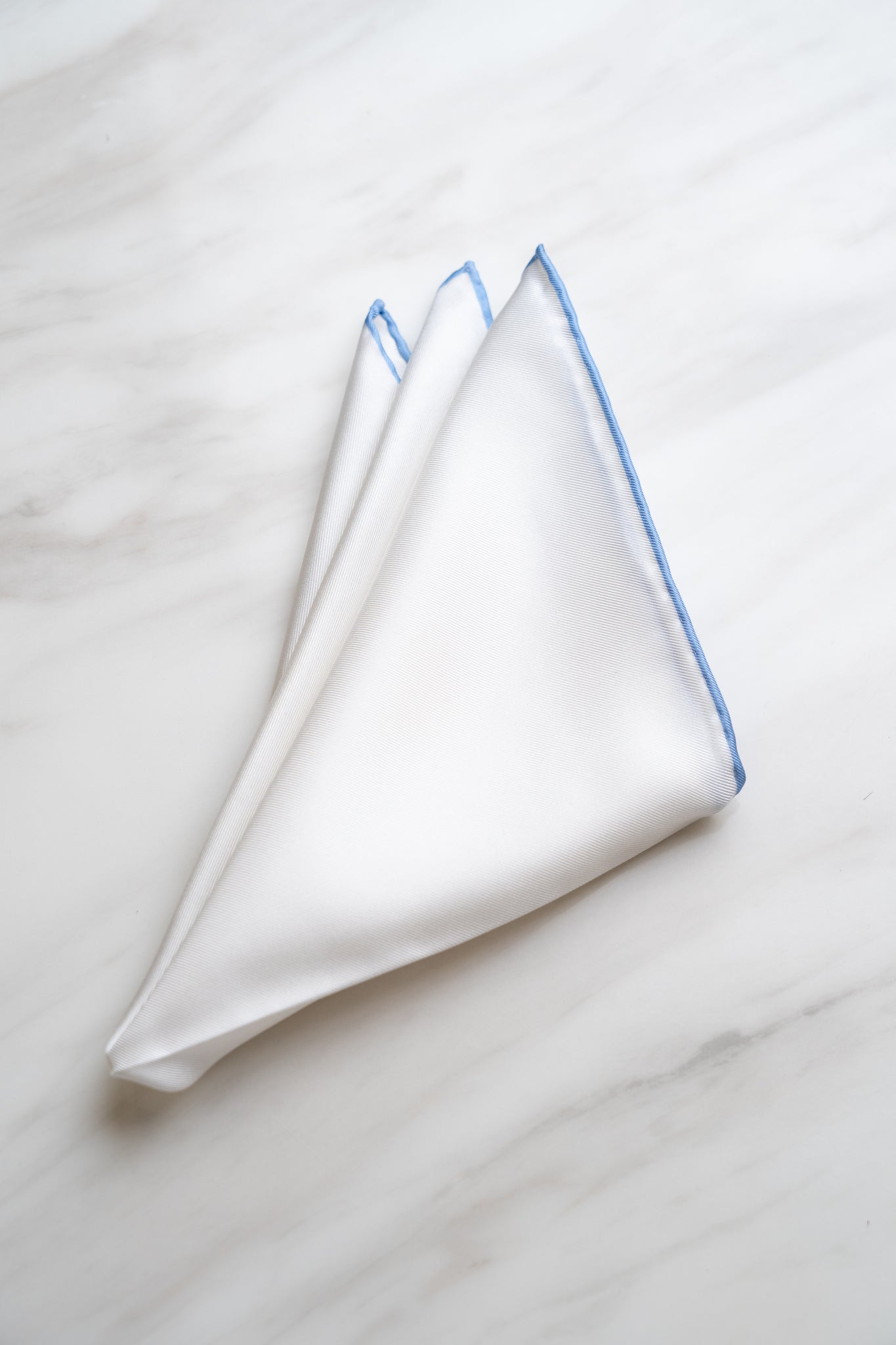 PS002WTBU White Pocket Square With Sky Blue Border